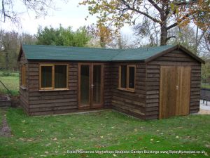Heavy Duty Workshop 22x20 'L' shaped, Stained Featheredge Cladding, French Doors, Joinery Windows and Felt Tiled Roof.