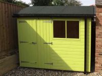 Deluxe Apex 11×7 with heavy Felt, Guttering, Double Doors and Painted Finish.