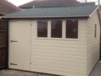 Deluxe Apex 11×9 with Green Felt Tiles, Guttering and Painted Finish.