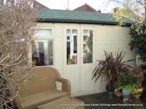 Heavy Duty Workshop Bespoke 14x7, Customers Double Part Glazed doors, Double Glazed Joinery Window, Felt Tiled Roof and Country Cream Finish.