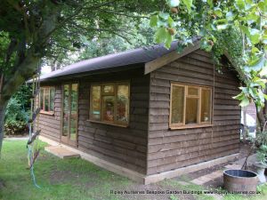 Heavy Duty Workshop Bespoke 24x14, Featheredge Cladding in dark stain, Joinery Windows, French Doors, Double Glazed, T&Gv Lined, Insulated, Facia & Soffit Tlied Roof.