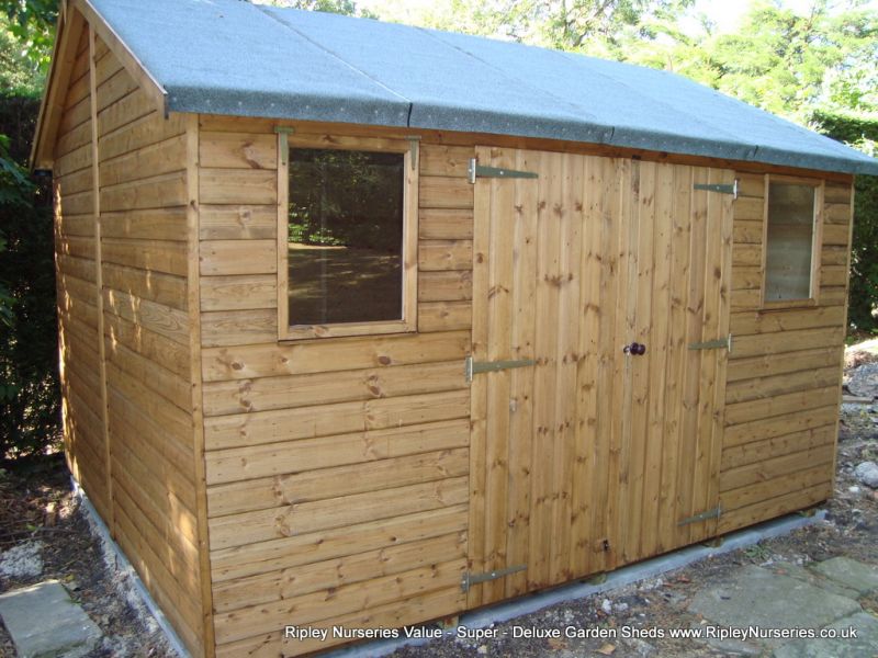 Deluxe Apex 12x10, Double Doors and Windows under eaves and Heavy Torch-On Felt.