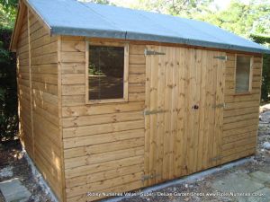 Deluxe Apex 12x10, Double Doors and Windows under eaves and Heavy Torch-On Felt.