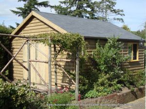 Heavy Duty Workshop 20x19, Garage Doors, Joinery Windows, Grey Felt Tiled Roof.