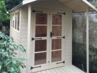 Deluxe Apex 11×7 Plus 2’6_ Verandah with Richmond Doors and Painted Finish.